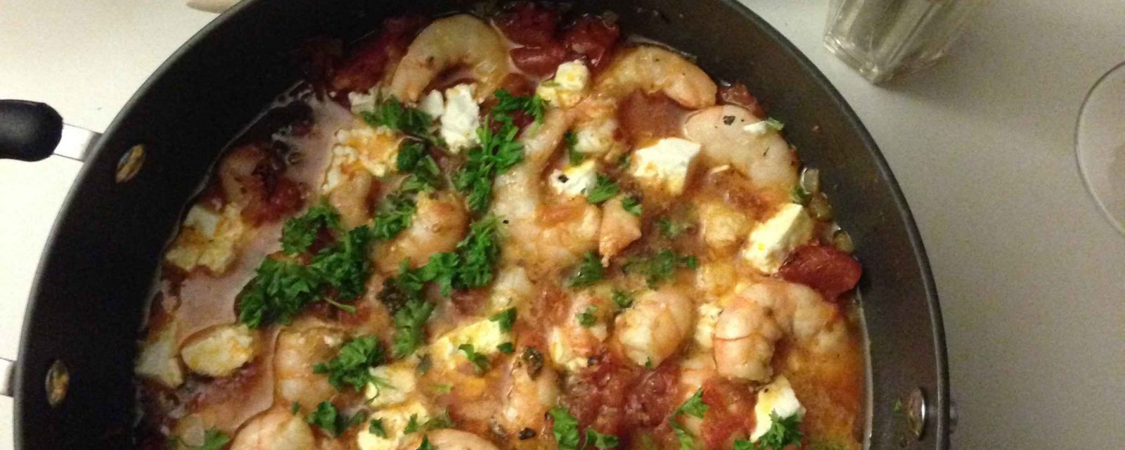 Recipe Shrimp Tomato and Feta prepared and displayed with bread