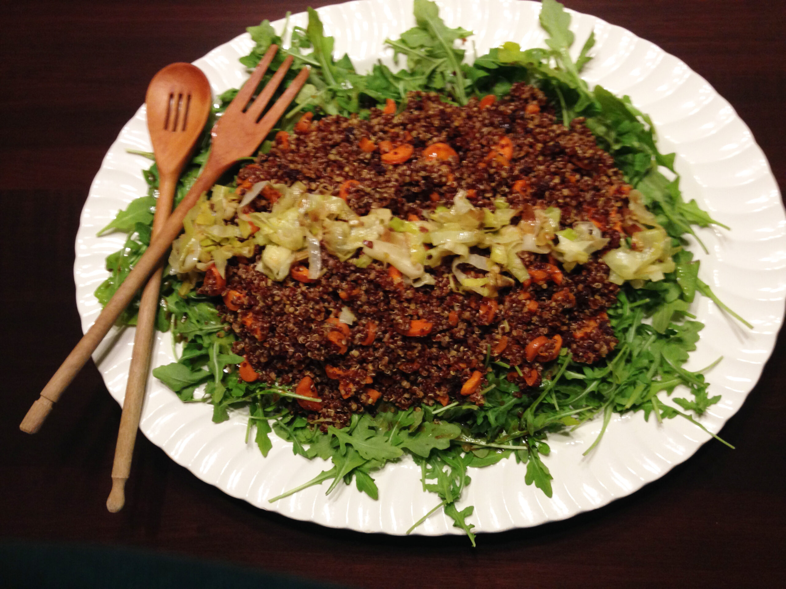 Prepared and artfully displayed recipe Quinoa Salad with Carrots and Frizzled Leeks